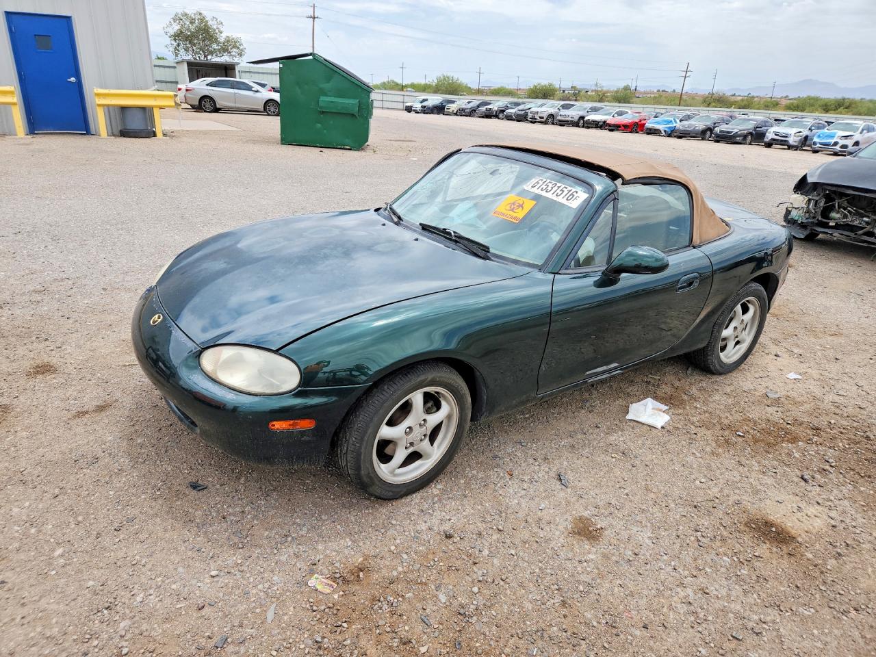 1999 Mazda MX-5 Miata, VIN JM1NB353XX0101030 — Side