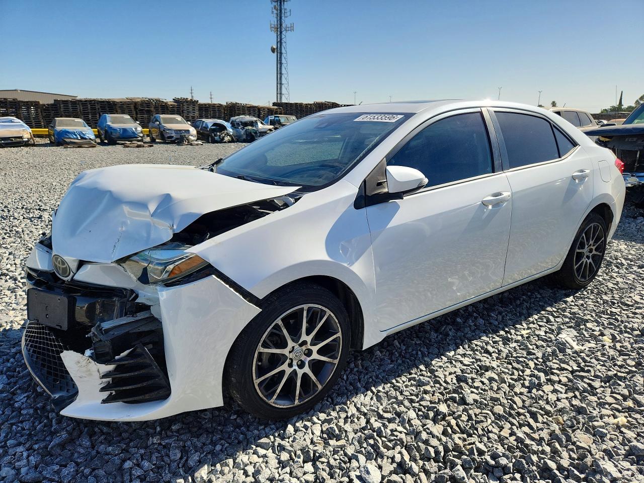 2017 Toyota Corolla LE, VIN 5YFBURHE3HP646779 — Front end
