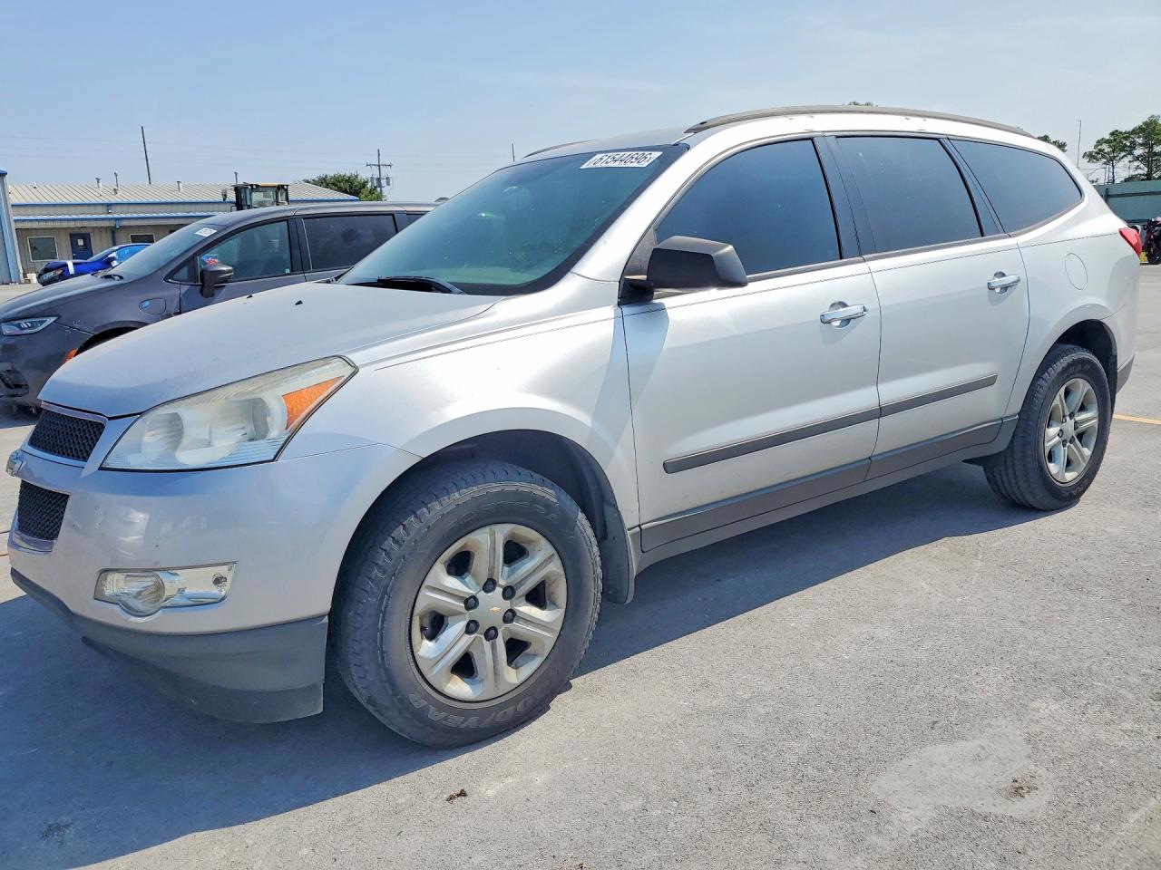 2012 Chevrolet Traverse LS, VIN 1GNKRFED2CJ392496 — Hail
