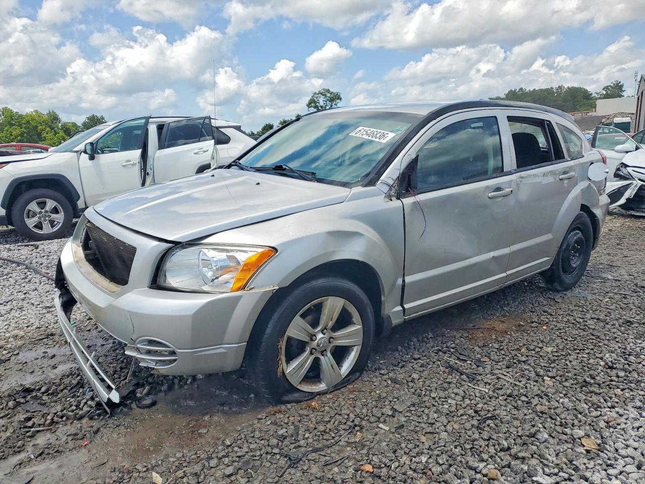 2010 Dodge Caliber SXT, VIN 1B3CB4HA1AD650494 — Side