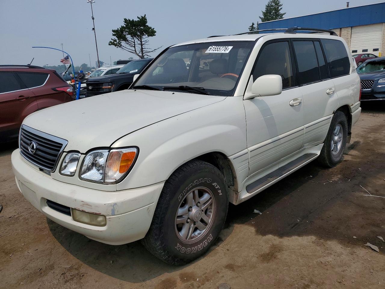 2000 Lexus LX 470, VIN JT6HT00W5Y0098542 — Minor dents and scratches