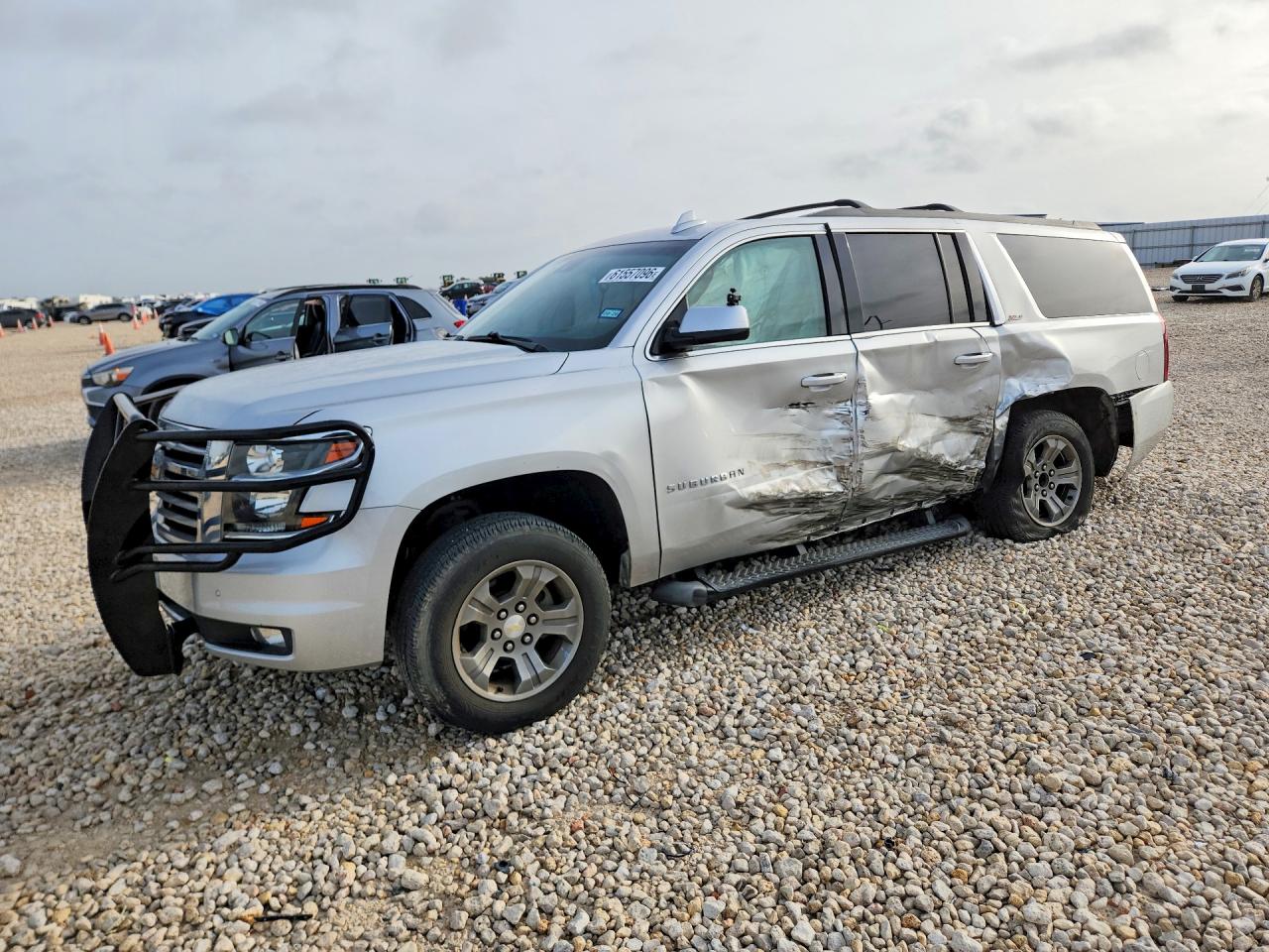 2016 Chevrolet Suburban LT, VIN 1GNSKHKC1GR449306 — Side
