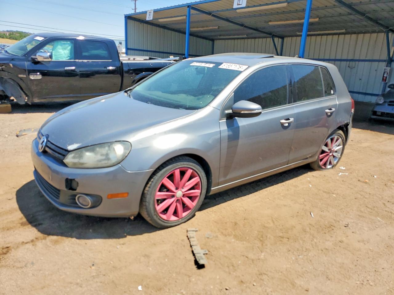 2011 Volkswagen Golf TDI, VIN WVWDM7AJ3BW035704 — Rear end