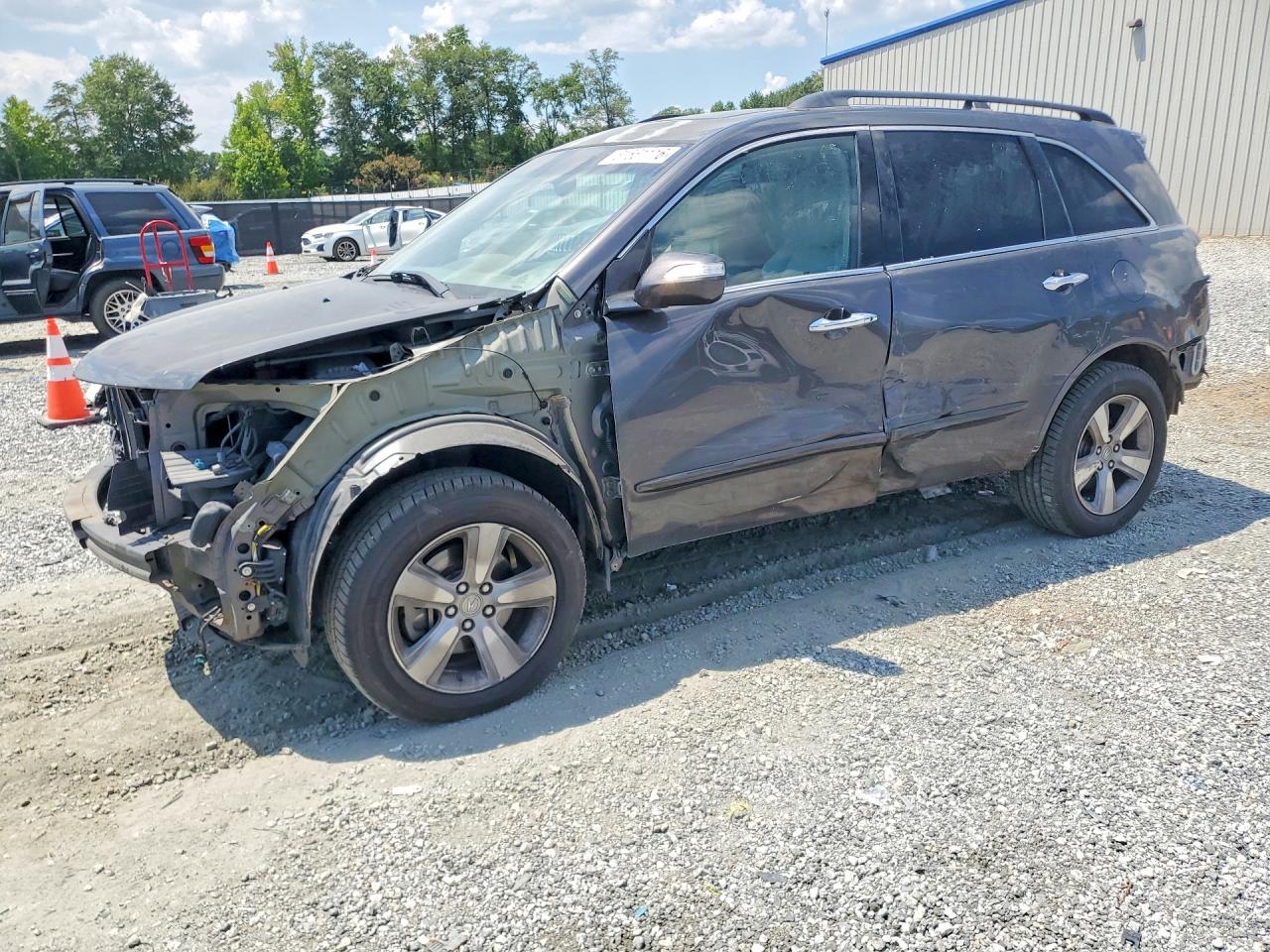2011 Acura MDX Technology, VIN 2HNYD2H60BH539545 — Side