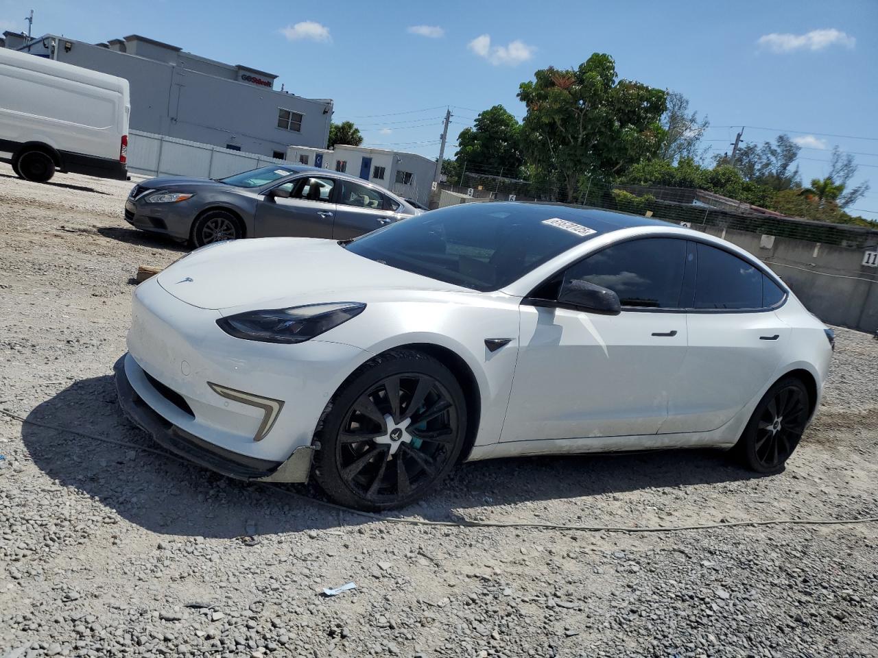 2021 Tesla Model 3 Standard Range Plus, VIN 5YJ3E1EA6MF020847 — Minor dents and scratches