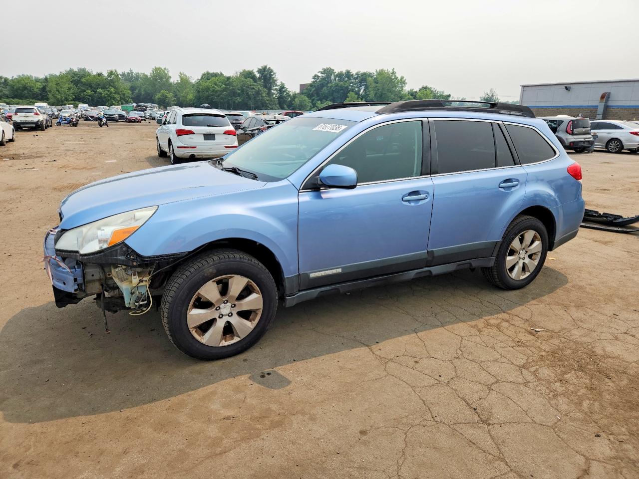 2011 Subaru Outback Premium, VIN 4S4BRBGC4B3403177 — Перед