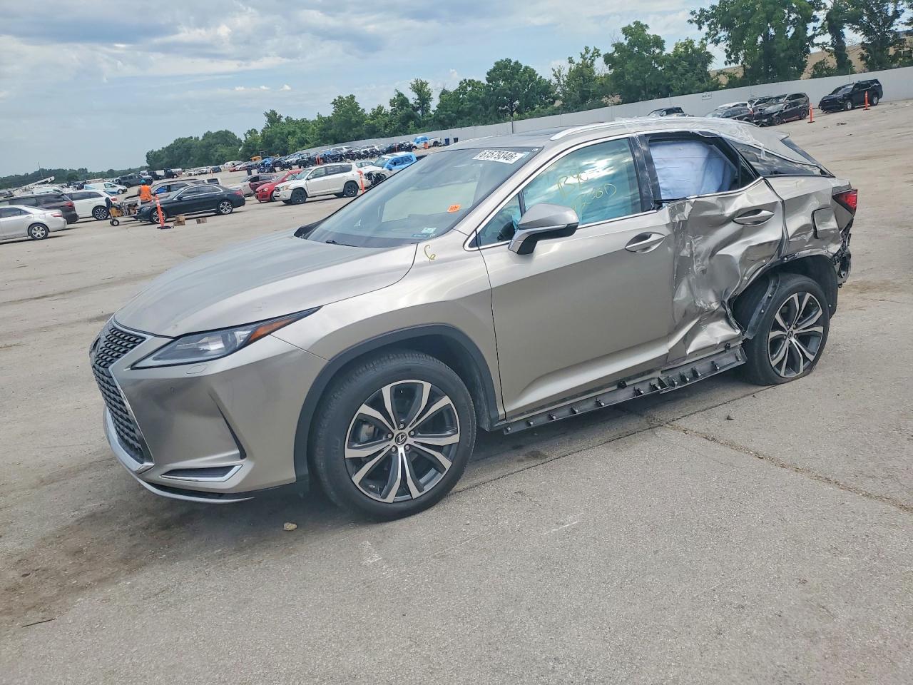 2021 Lexus RX 350, VIN 2T2HZMDA4MC267572 — Бок