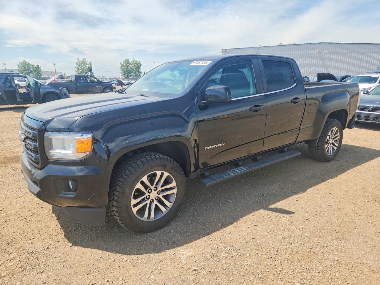 2016 GMC Canyon 4WD SLE, VIN 1GTG6CE38G1261897 — Rear end