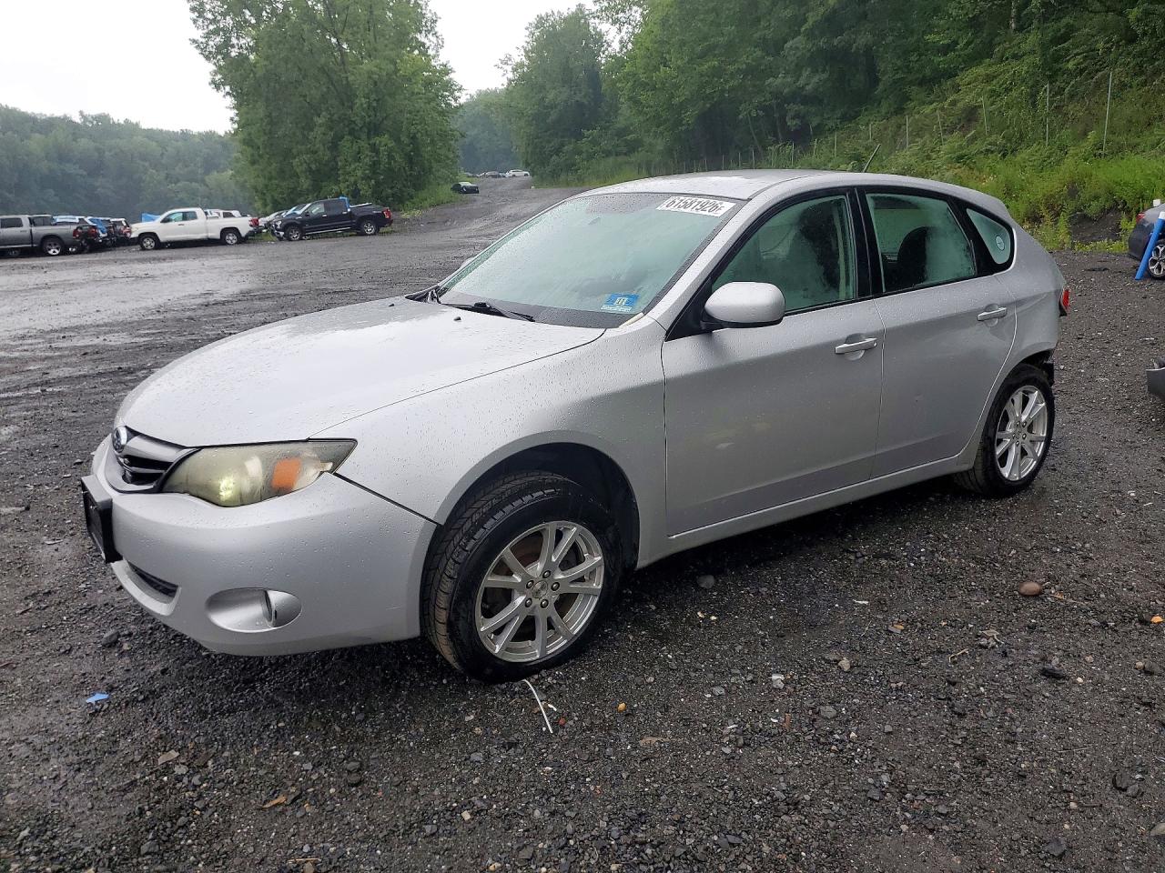 2011 Subaru Impreza 2.5i, VIN JF1GH6A62BH806090 — Зад
