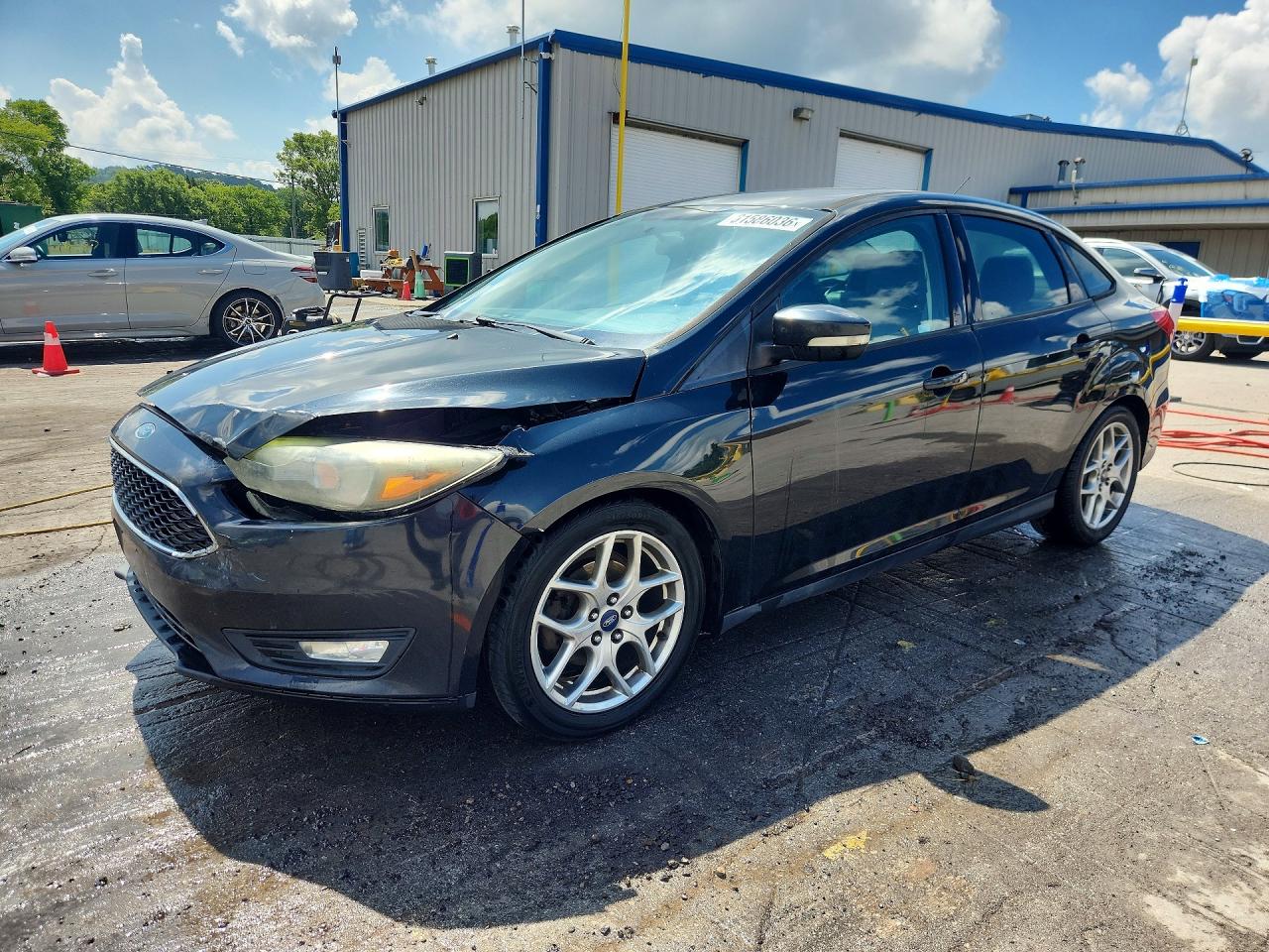 2015 Ford Focus SE, VIN 1FADP3F20FL334503 — Front end