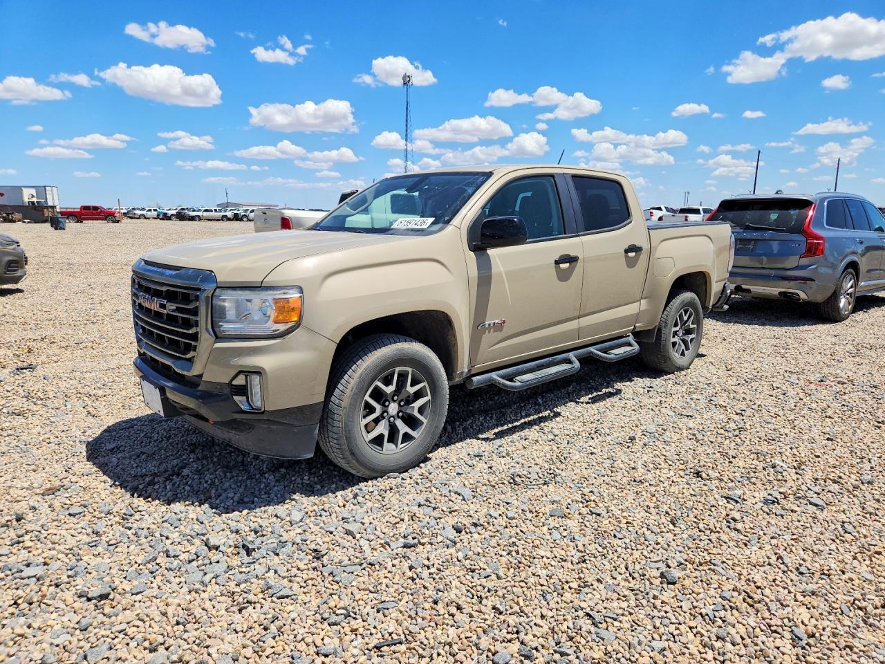 2021 GMC Canyon 4WD AT4, VIN 1GTG6FEN9M1148359 — Град