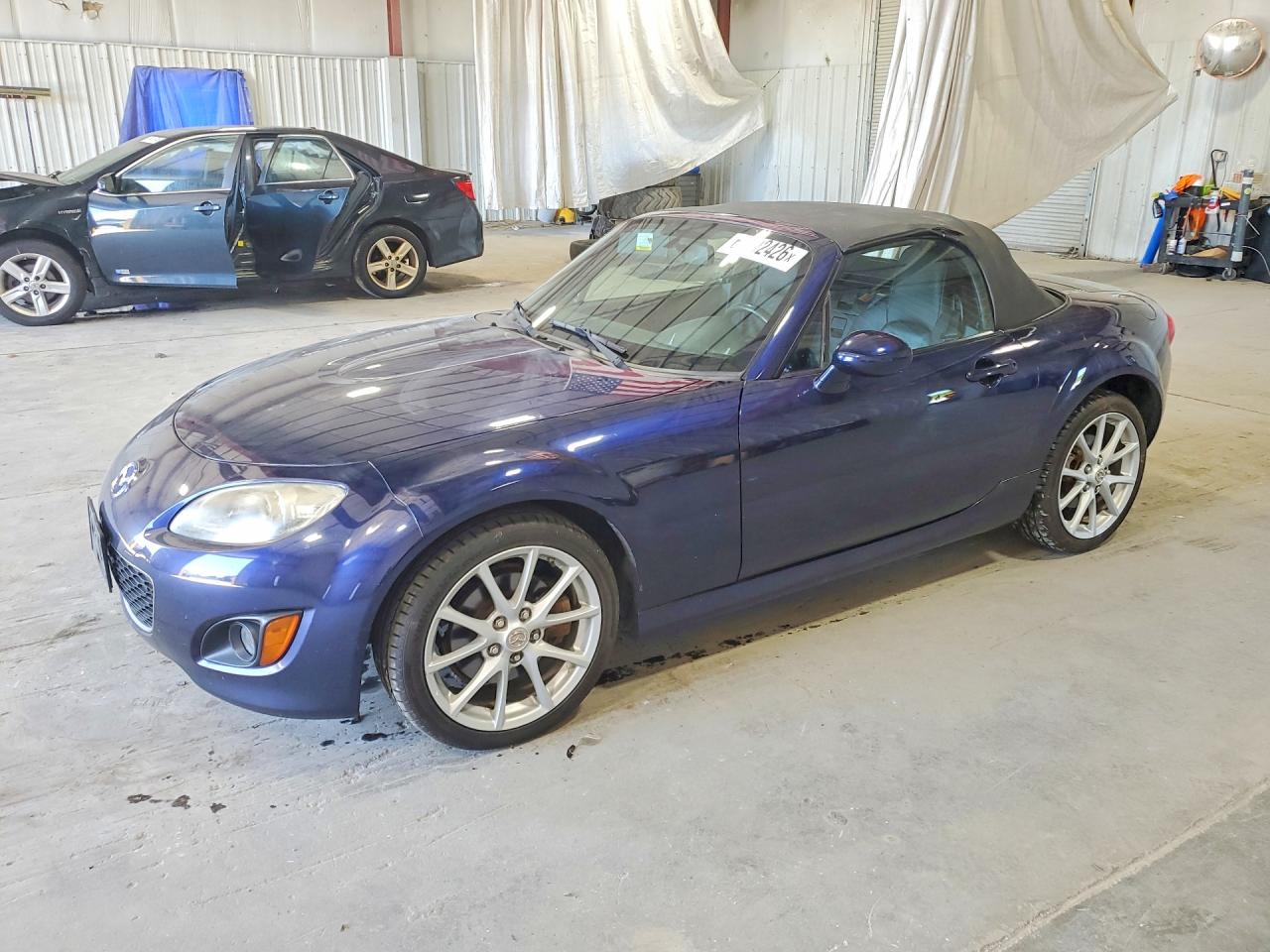 2009 Mazda MX-5 Miata Sport, VIN JM1NC25F590202626 — Normal wear