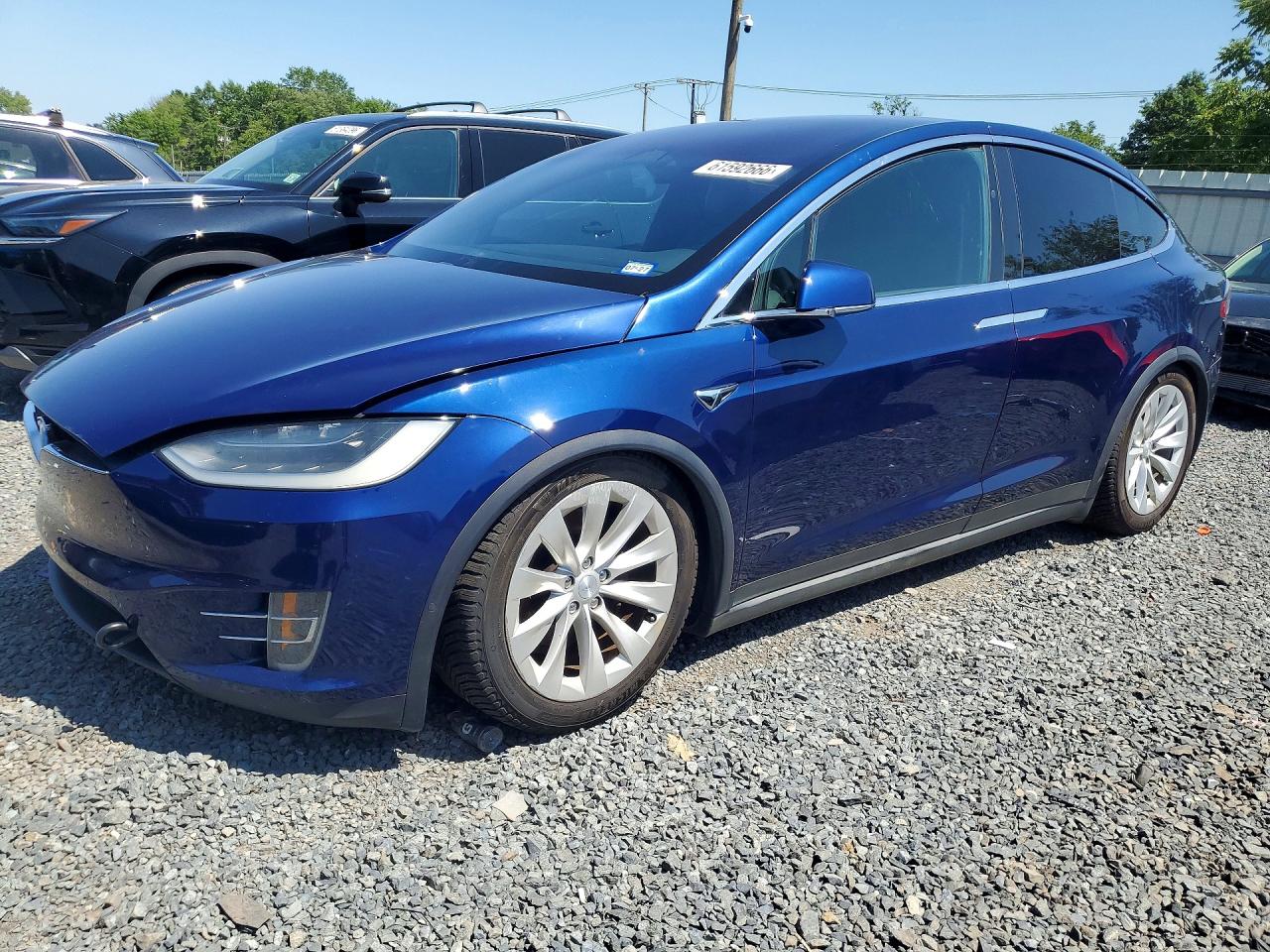 2017 Tesla Model X 90D, VIN 5YJXCBE24HF054703 — Minor dents and scratches