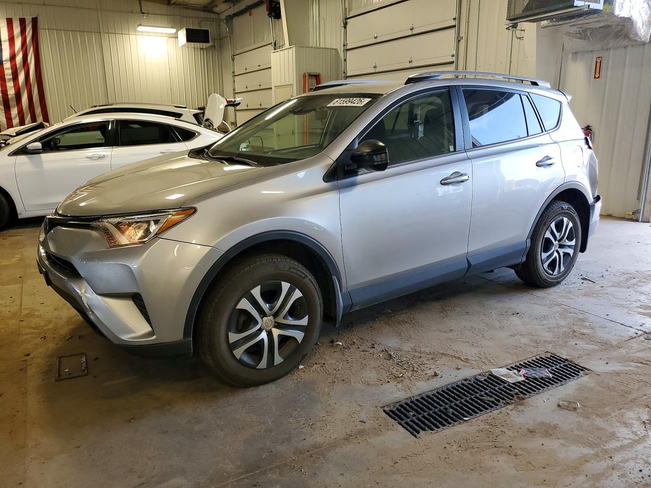 2018 Toyota RAV4 LE, VIN JTMBFREV2JJ199757 — Rear end