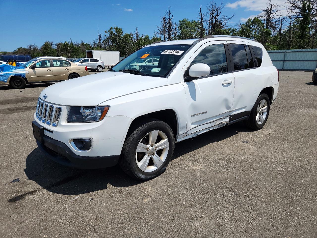 2015 Jeep Compass High Altitude, VIN 1C4NJDEB6FD174841 — Бок