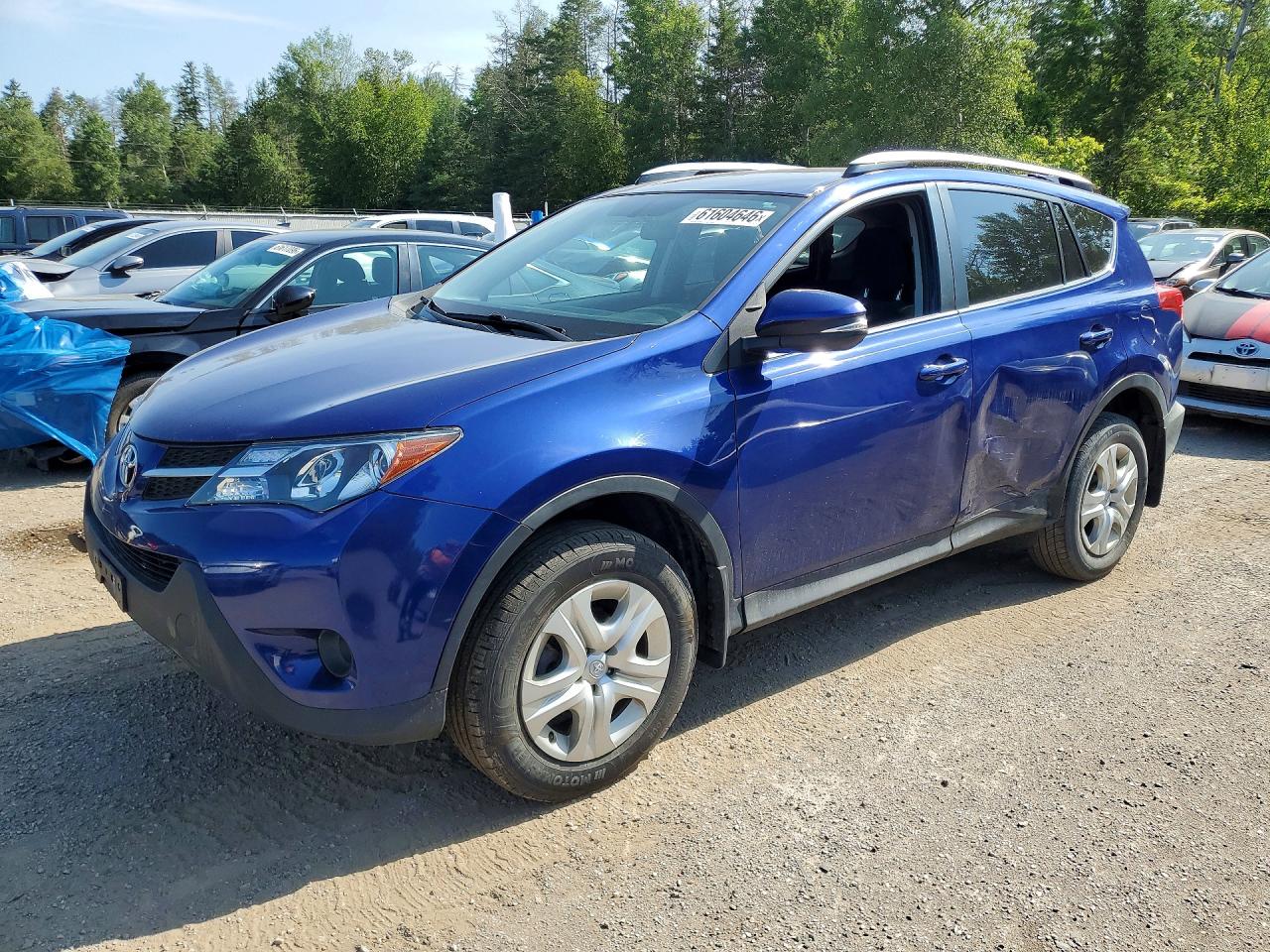 2015 Toyota RAV4 LE, VIN 2T3ZFREV7FW142963 — Side
