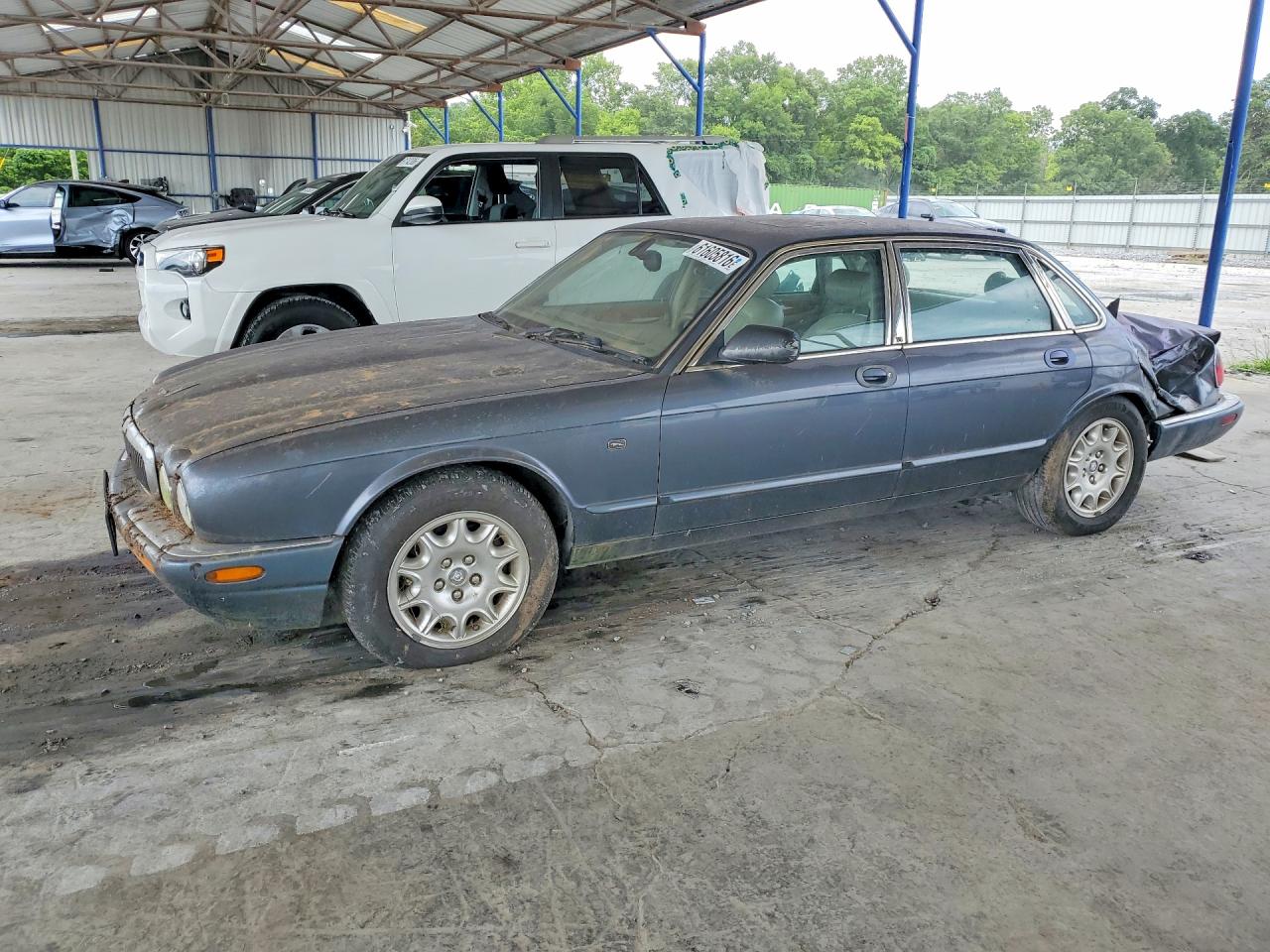 2000 Jaguar XJ, VIN SAJDA14C1YLF13765 — Rear end