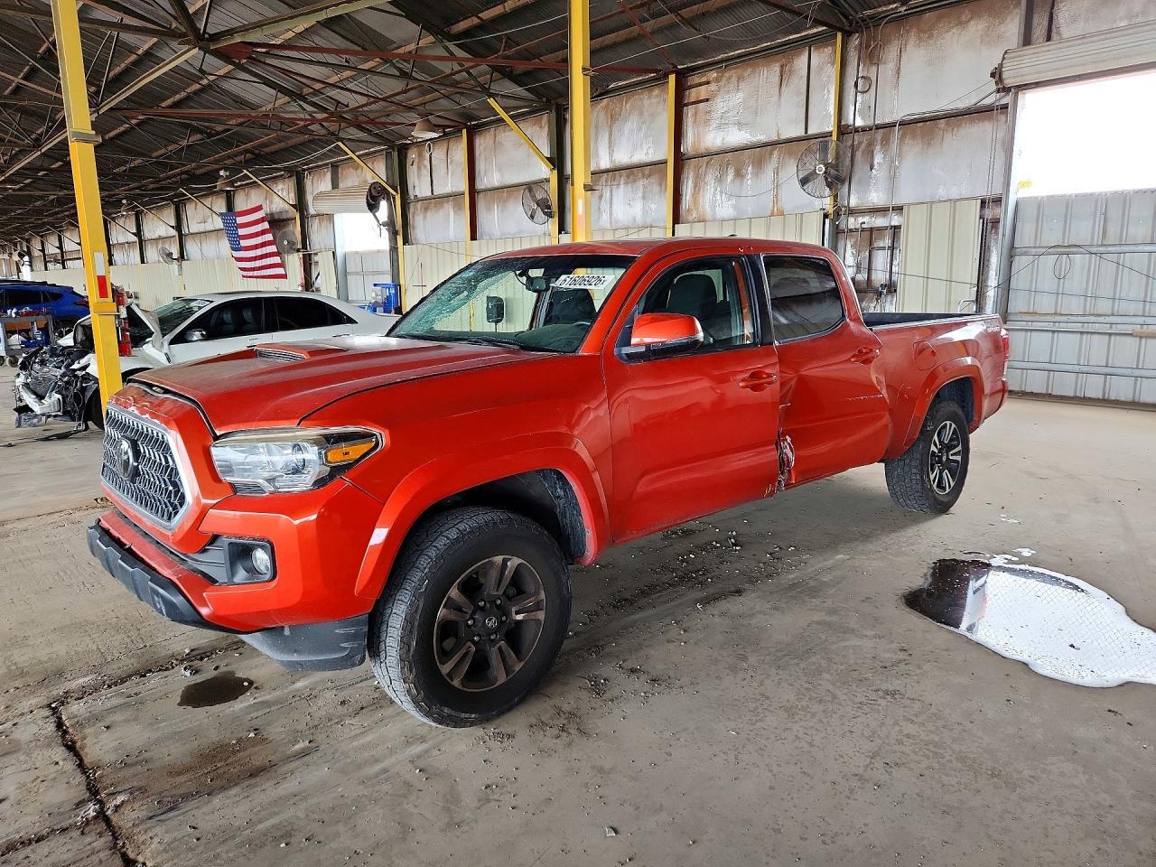 2016 Toyota Tacoma SR5, VIN 5TFDZ5BN0GX010817 — Burn