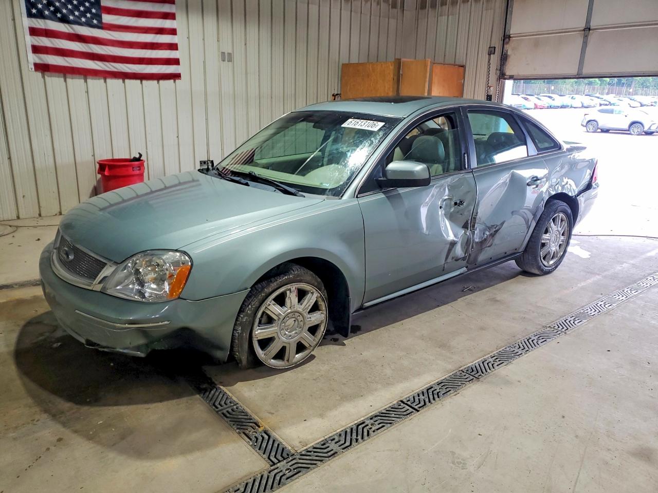 2007 Ford Five Hundred SEL, VIN 1FAFP24167G120557 — Зад