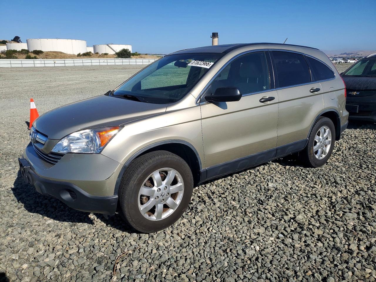 2007 Honda CR-V EX, VIN JHLRE38577C042008 — Side