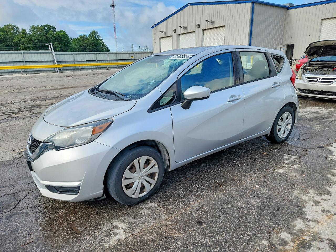 2017 Nissan Note SV, VIN 3N1CE2CP1HL359703 — Hail