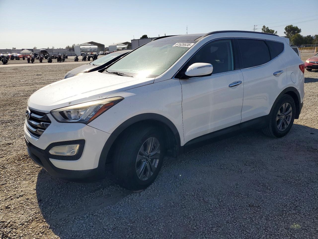 2015 Hyundai Santa Fe, VIN 5XYZU3LB7FG256438 — Minor dents and scratches