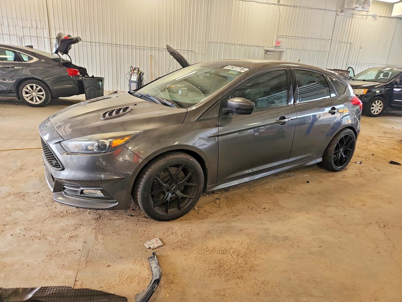 2015 Ford Focus ST, VIN 1FADP3L97FL373252 — Minor dents and scratches