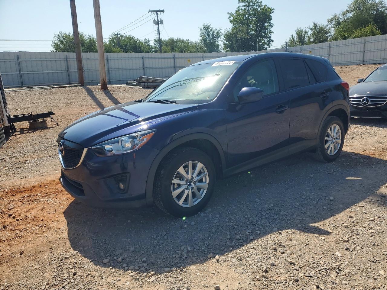 2013 Mazda CX-5 Touring, VIN JM3KE2CE7D0148091 — Град