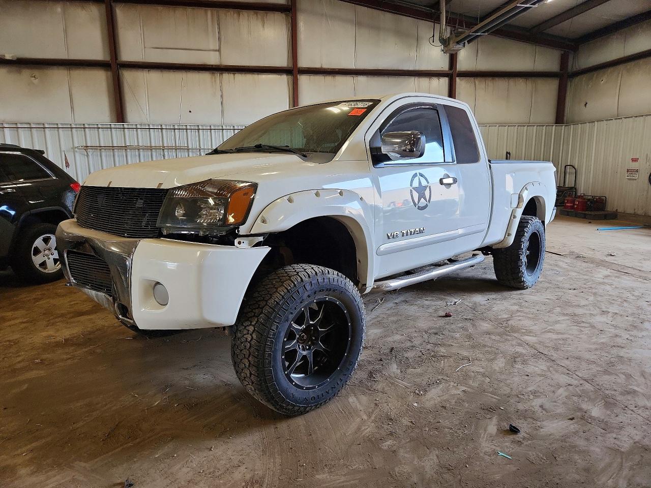2009 Nissan Titan SE, VIN 1N6AA06C49N305095 — Side