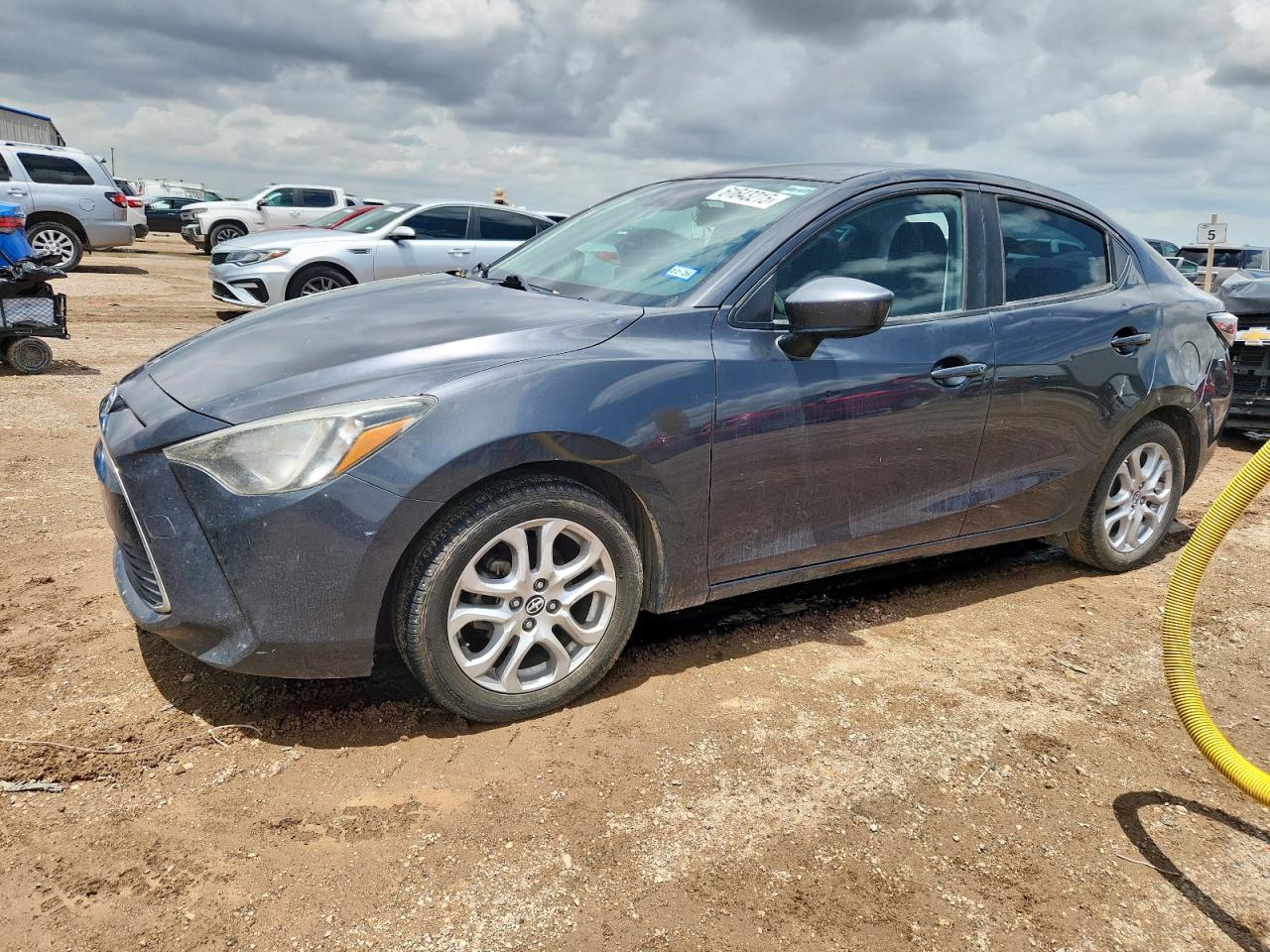 2016 Scion iA, VIN 3MYDLBZV0GY125830 — Hail