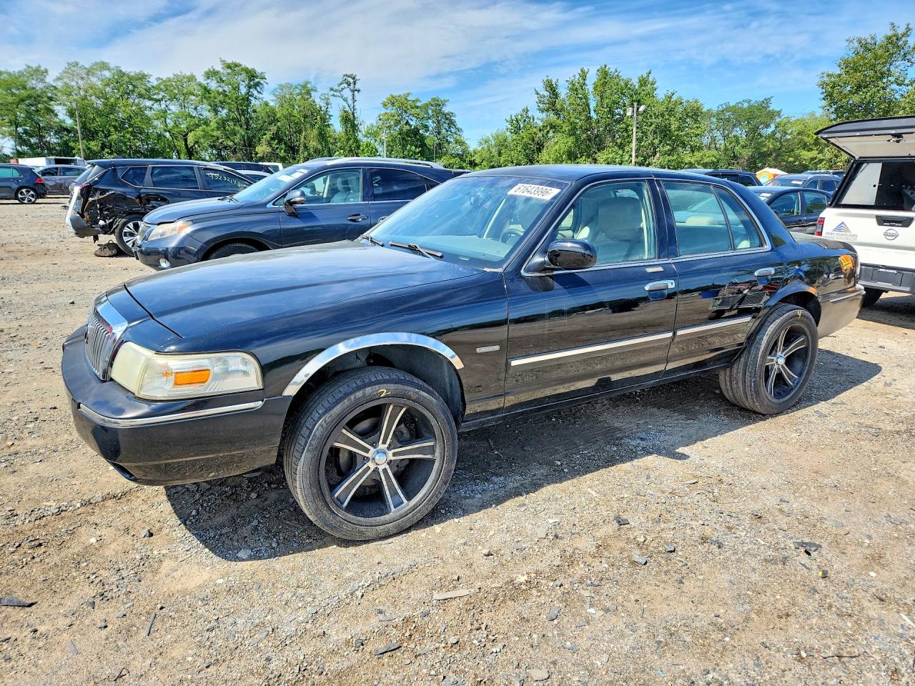 2009 Mercury Grand Marquis LS, VIN 2MEHM75V59X624149 — Мелкие вмятины и царапины