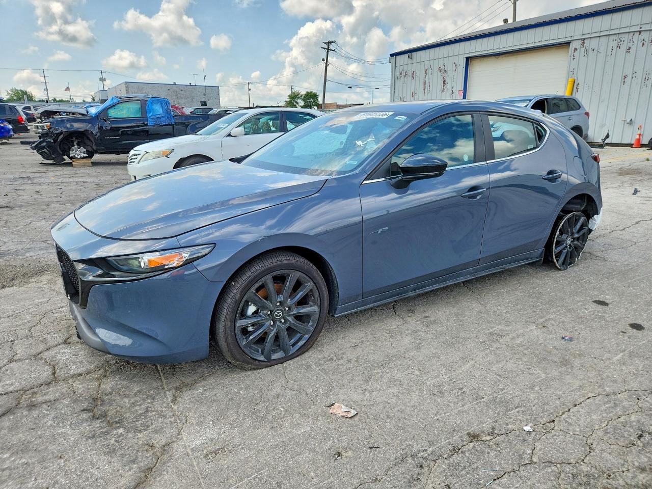 2026 Mazda 3 S Carbon Edition, VIN JM1BPBLL8T1868848 — Rear end
