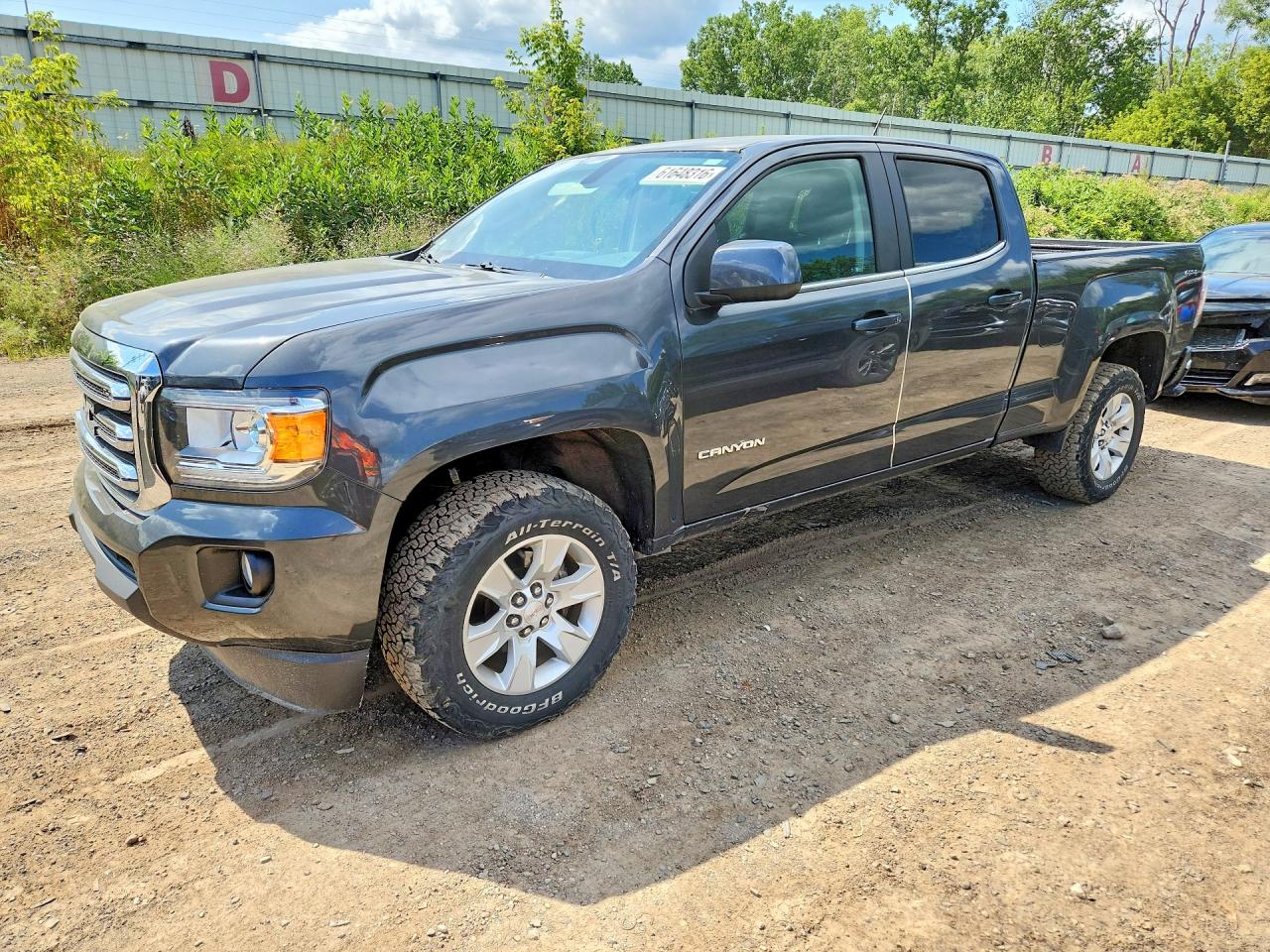2016 GMC Canyon 4WD SLE, VIN 1GTG6CE39G1119428 — Front end