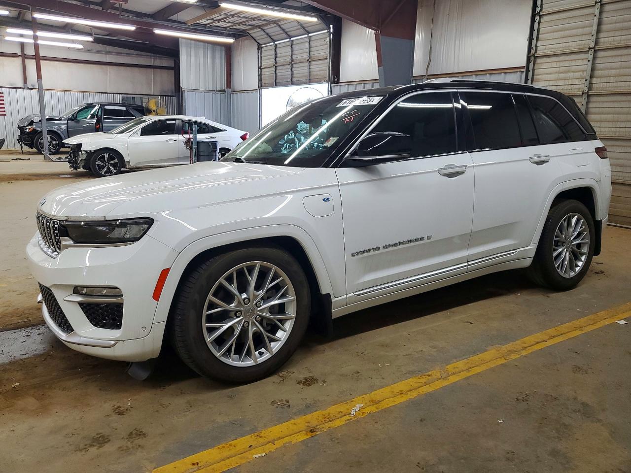 2022 Jeep Grand Cherokee Summit, VIN 1C4RJYE61N8755991 — Frame damage