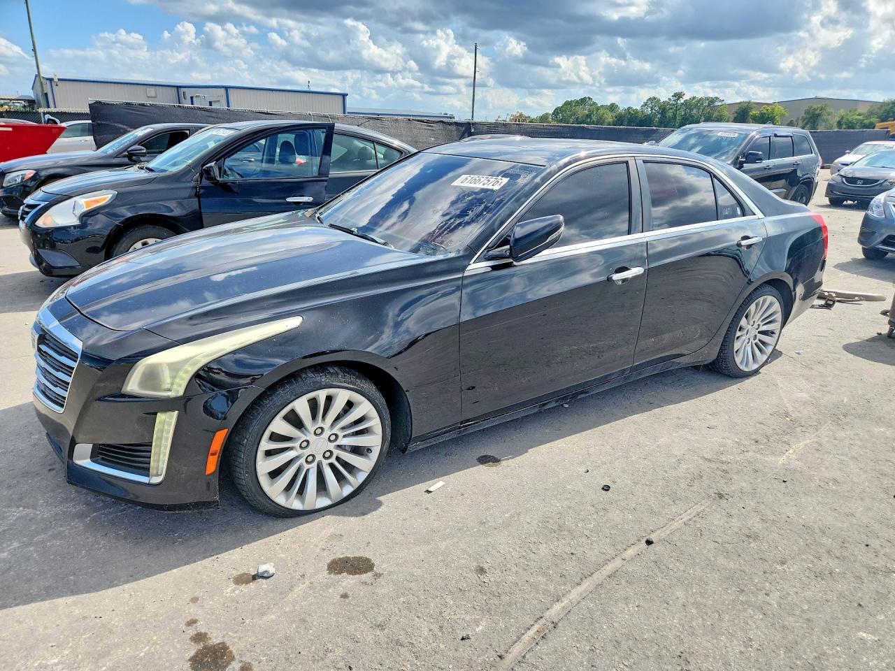 2015 Cadillac CTS Luxury RWD, VIN 1G6AR5SX7F0115790 — Minor dents and scratches