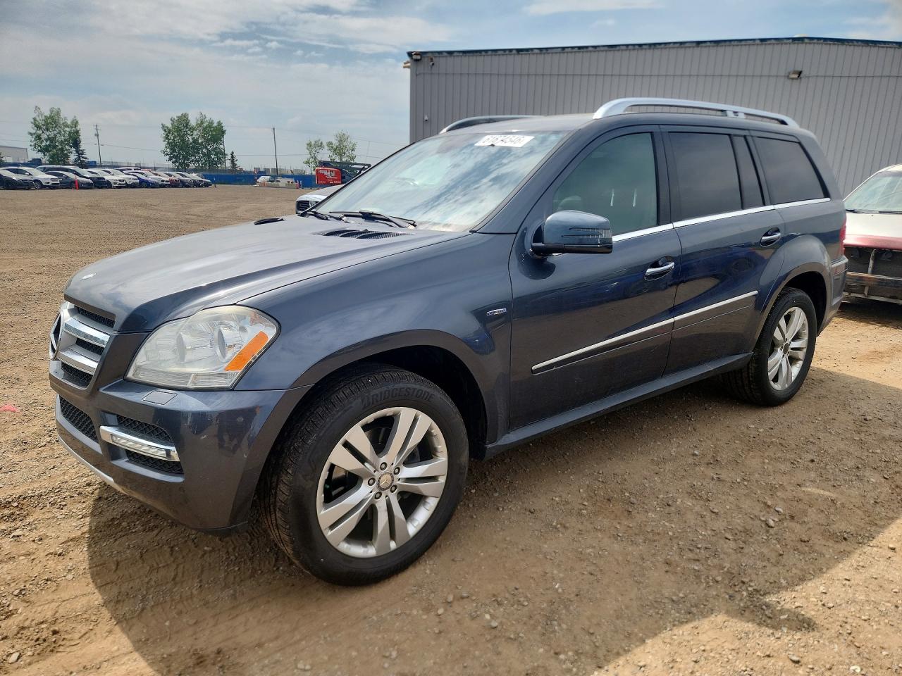 2011 Mercedes-Benz GL 350, VIN 4JGBF2FE9BA670595 — Side