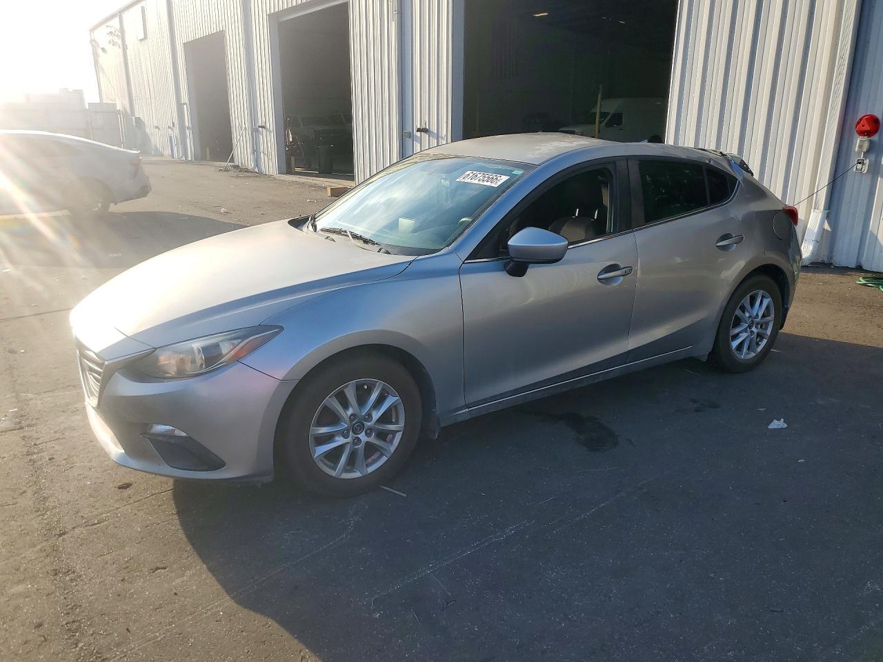 2014 Mazda 3 i Touring, VIN JM1BM1L72E1160376 — Roof