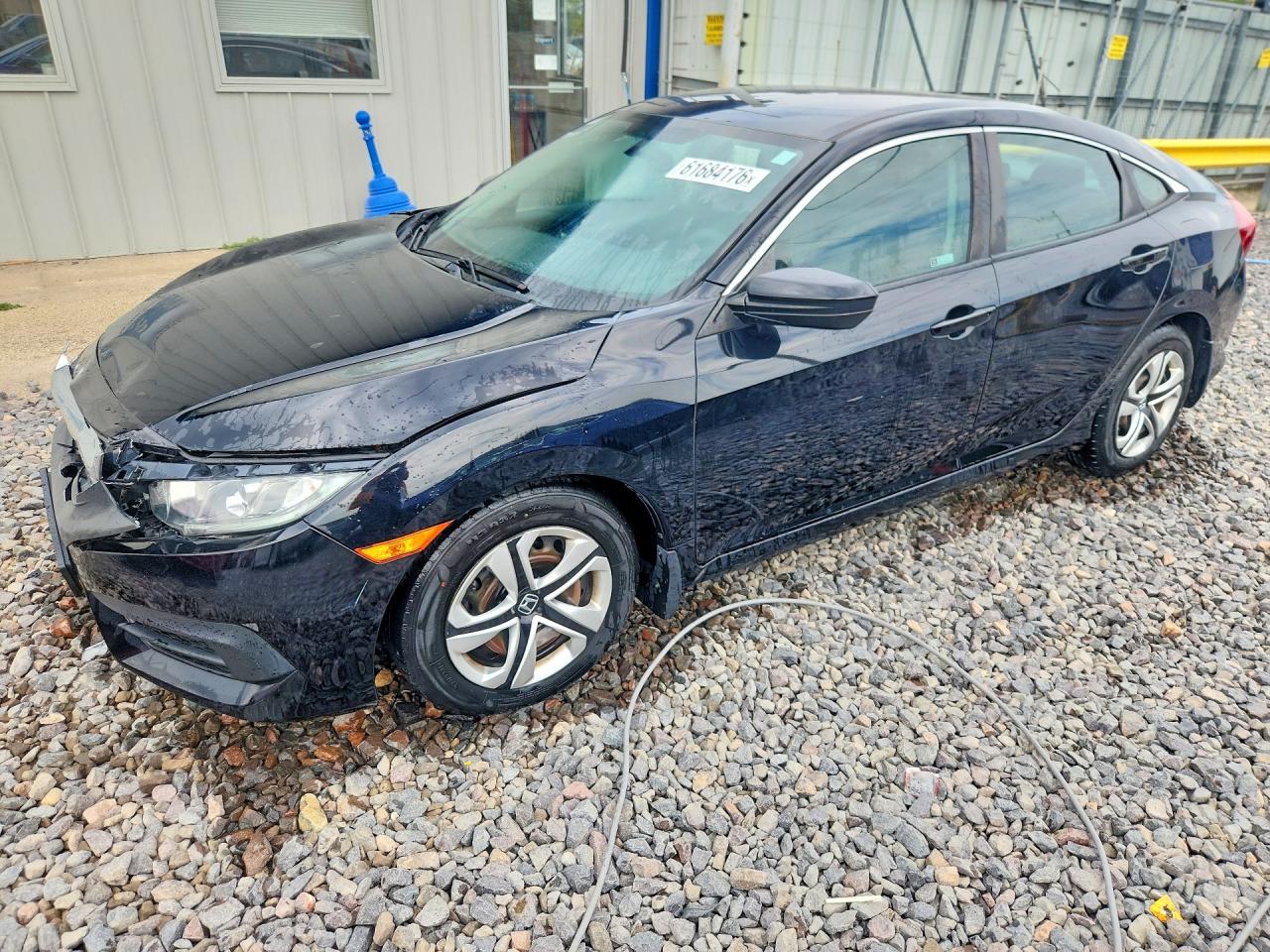 2018 Honda Civic LX, VIN 19XFC2F52JE041478 — Front end