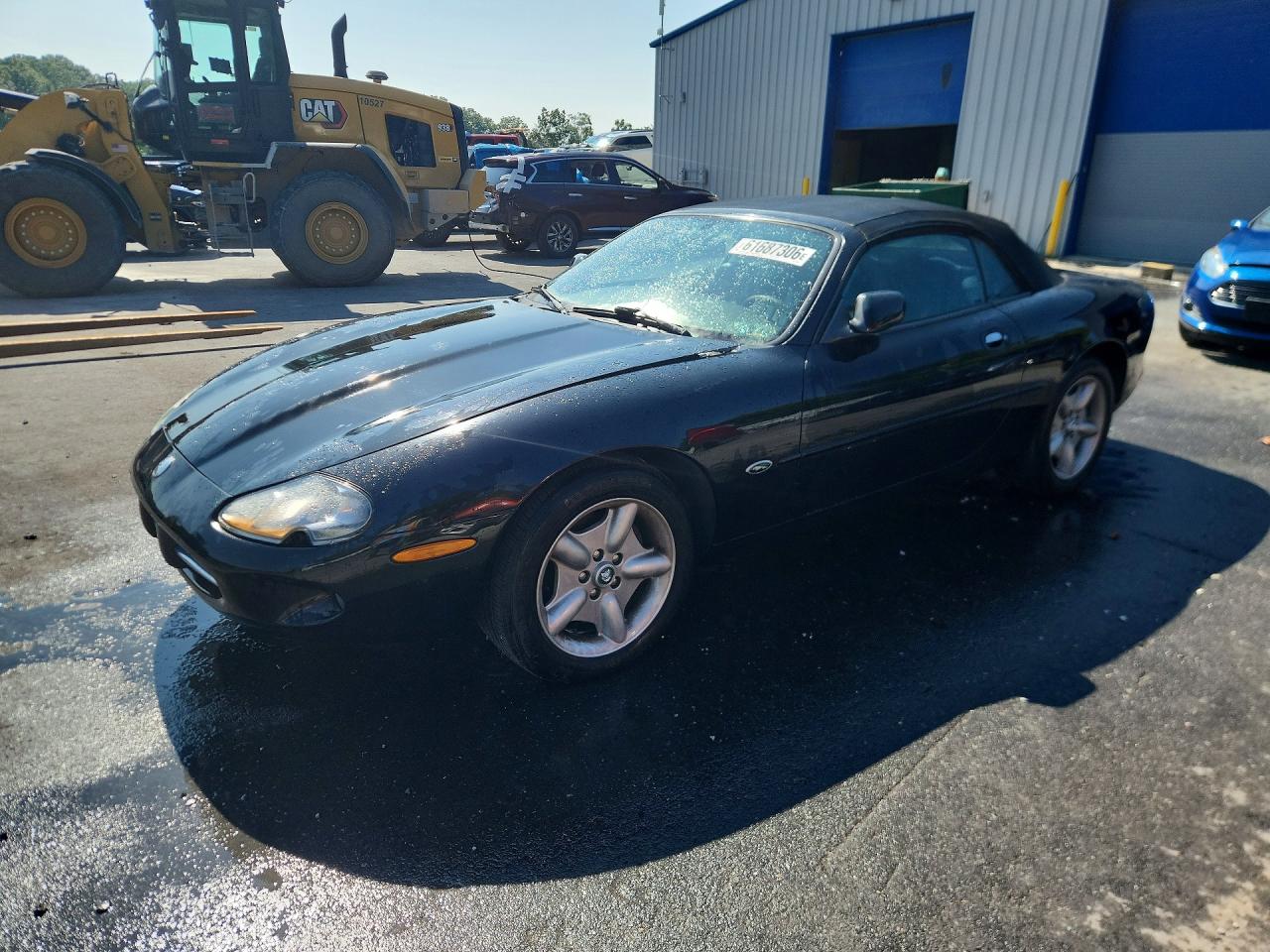 1999 Jaguar XK, VIN SAJGX204XXC041884 — Side