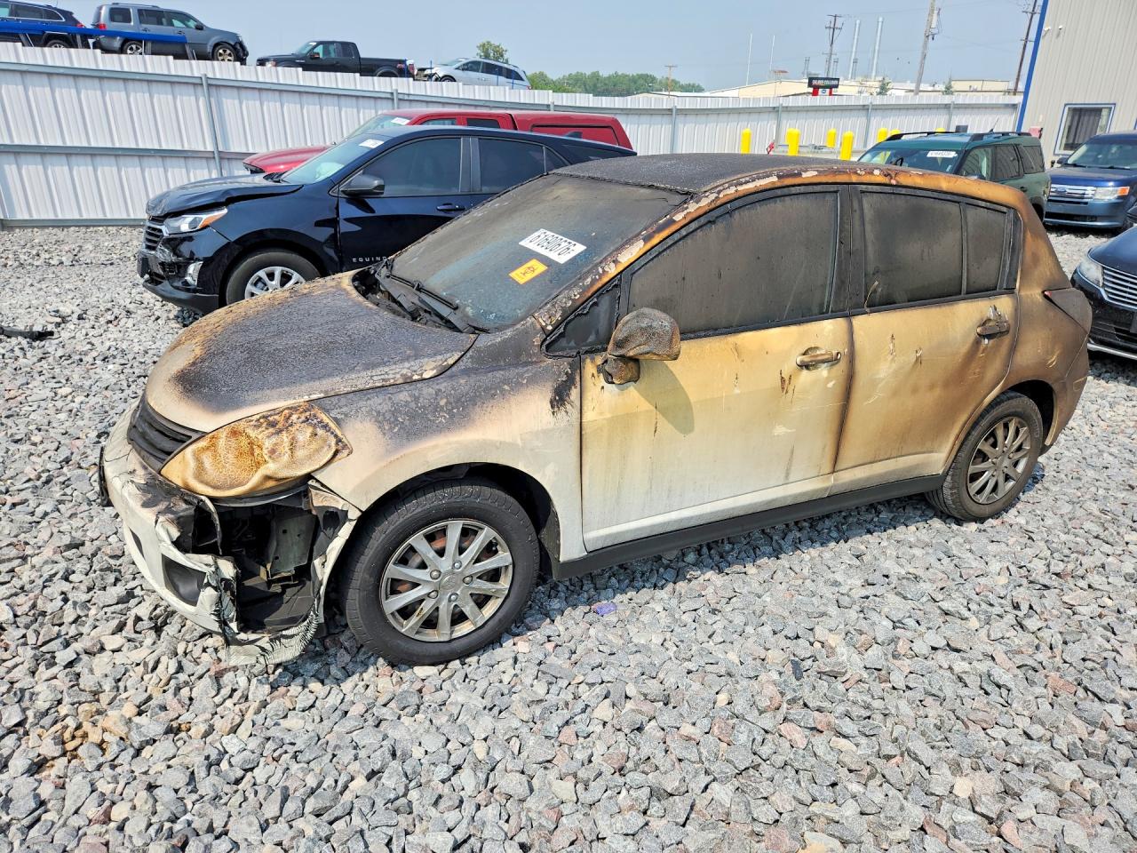 2010 Nissan Versa S, VIN 3N1BC1CP2AL448102 — Burn