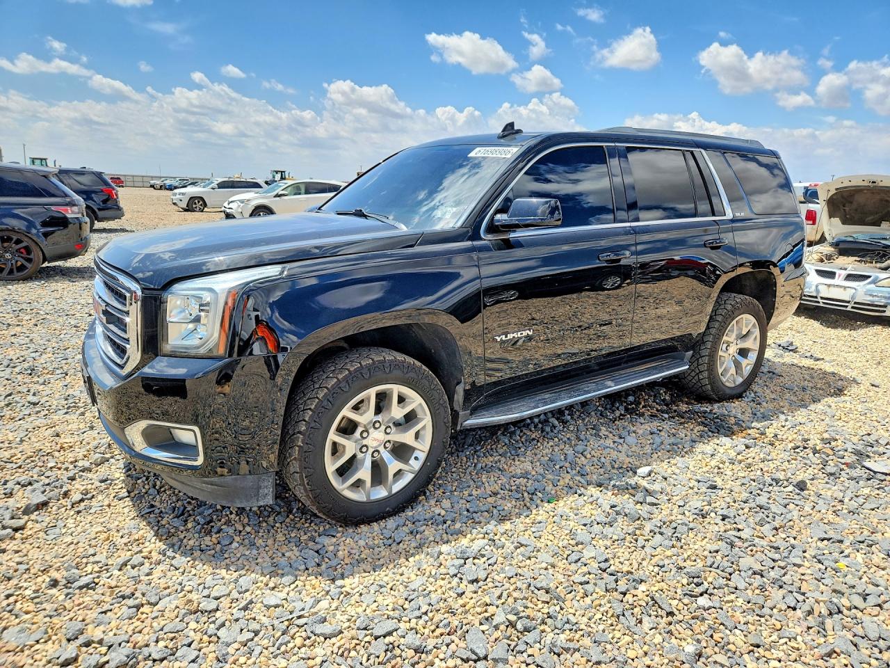 2019 GMC Yukon SLE, VIN 1GKS1AKC5KR306035 — Hail