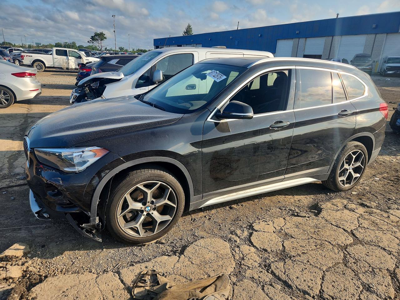 2019 BMW X1 xDrive28i, VIN WBXHT3C59K5L91497 — Front end