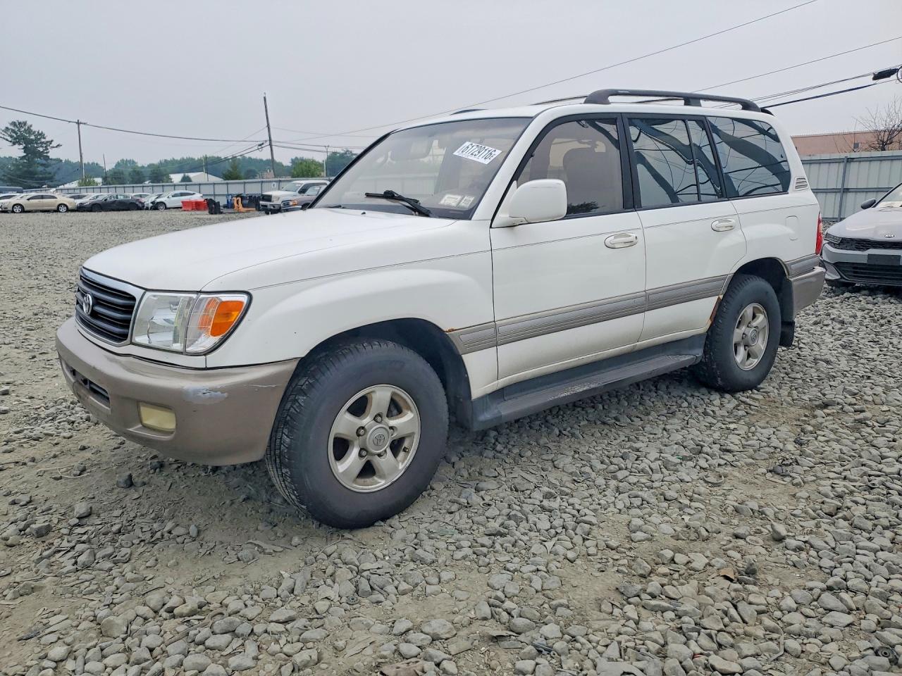 1999 Toyota Land Cruiser, VIN JT3HT05J8X0035654 — Minor dents and scratches