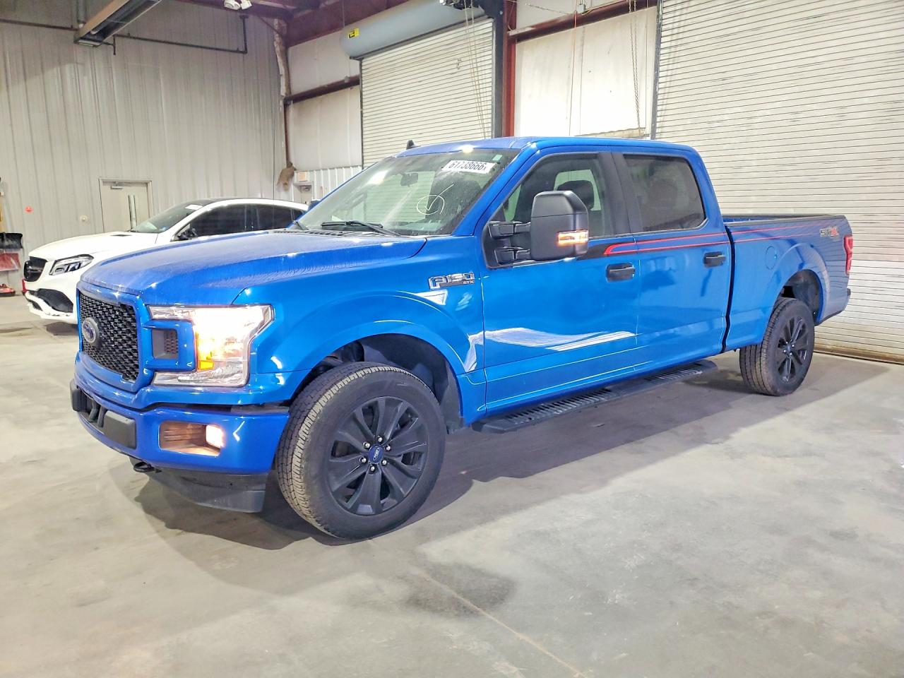 2020 Ford F-150 XLT, VIN 1FTFW1E46LFB74635 — Бок