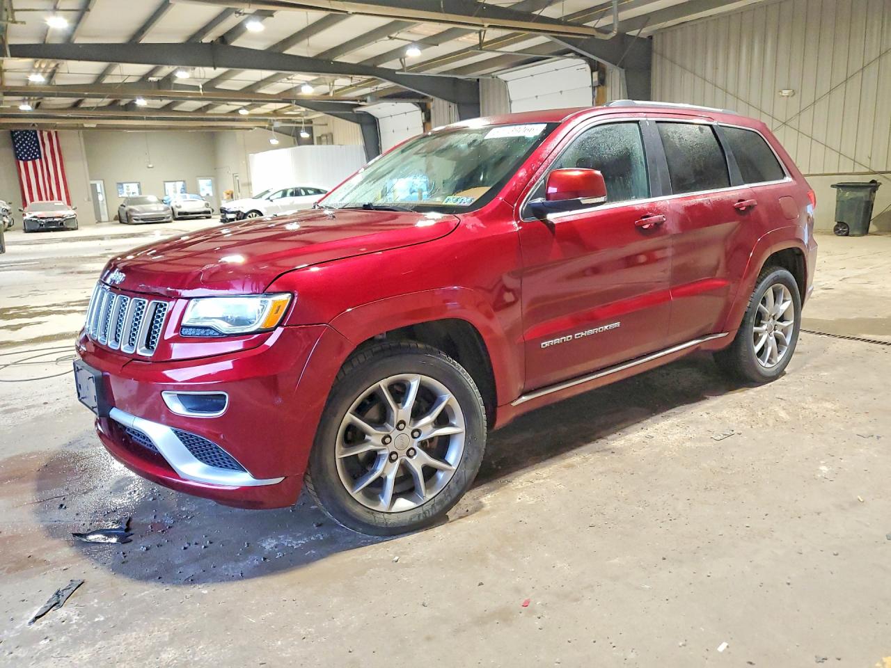 2016 Jeep Grand Cherokee Summit, VIN 1C4RJFJG9GC325533 — Side