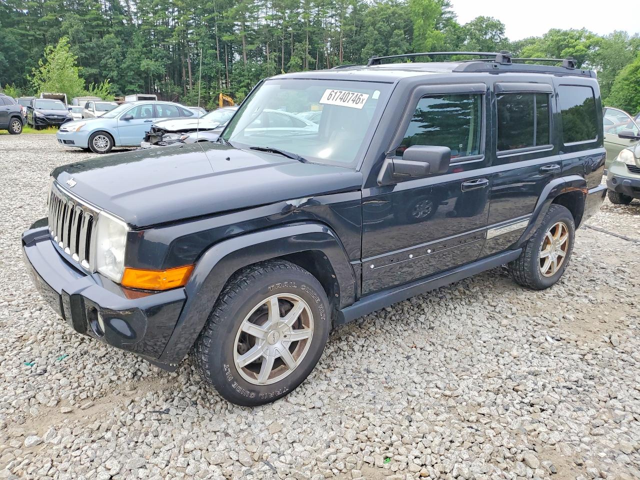 2010 Jeep Commander Sport, VIN 1J4RG4GK1AC137220 — Side