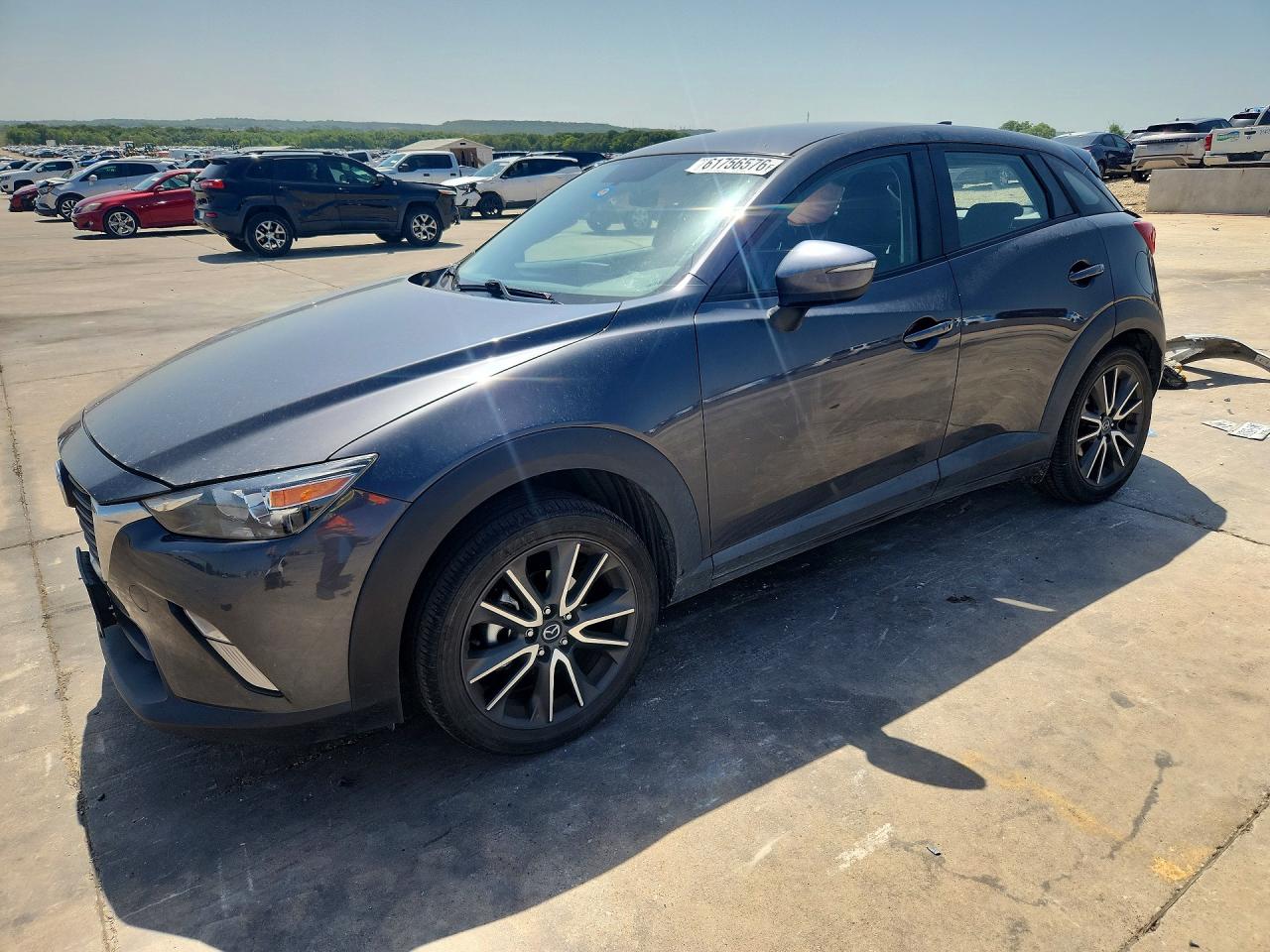 2017 Mazda CX-3 Touring, VIN JM1DKDC74H0179926 — Rear end