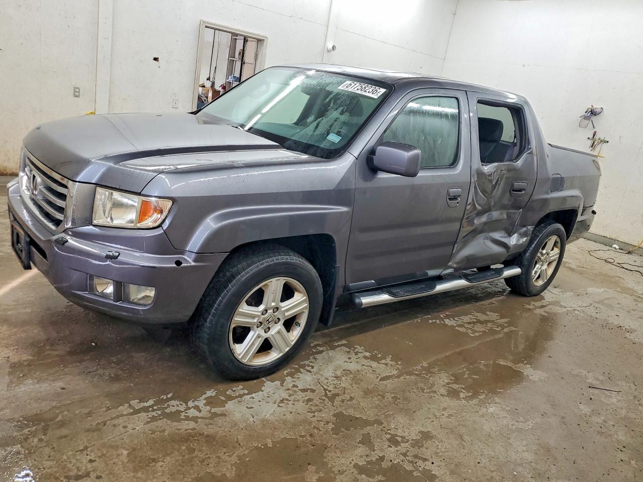 2014 Honda Ridgeline RTL, VIN 5FPYK1F59EB008085 — Side