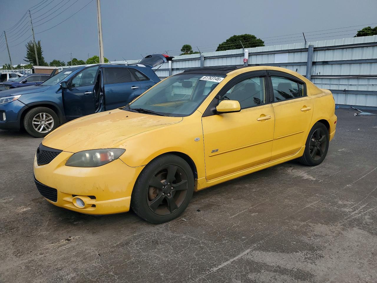 2004 Mazda 3 s, VIN JM1BK323141197028 — Side