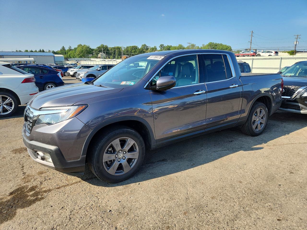 2020 Honda Ridgeline RTL-E, VIN 5FPYK3F76LB014579 — Rear end